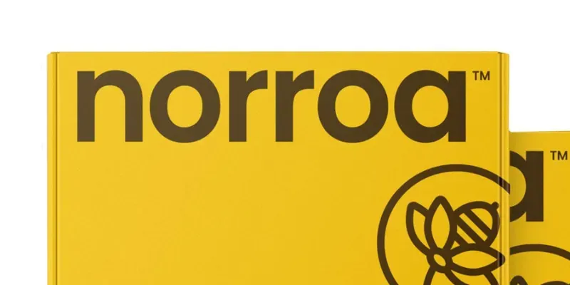 A yellow cardboard box labelled with the word norroa